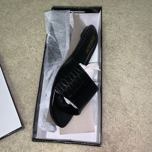 Black leather sandals